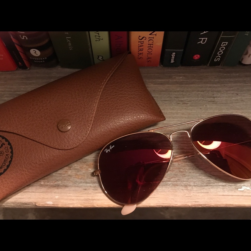 Red tinted ray bans, never worn. With case